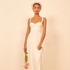 New with tags Hollyhock dress by Reformation. Color is ivory, size 6.